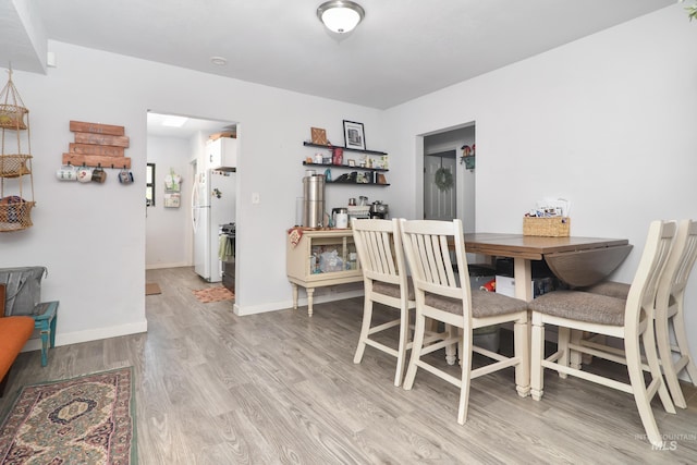 1713 Blaine St, Caldwell, ID 83605 - dining space with wood finished floors and baseboards