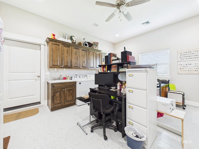 office space featuring washing machine and dryer and ceiling fan