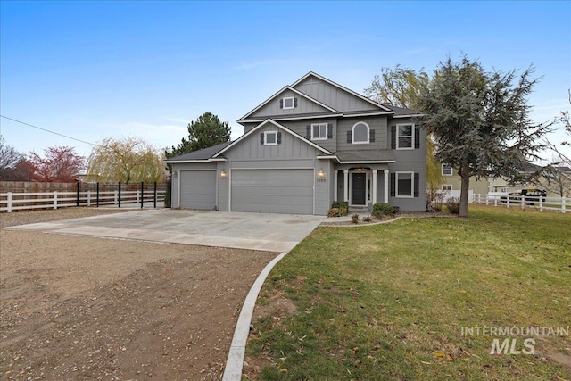 view of front of house with a front lawn and a garage