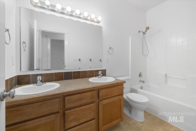 full bathroom with tile patterned floors, vanity, toilet, and tub / shower combination