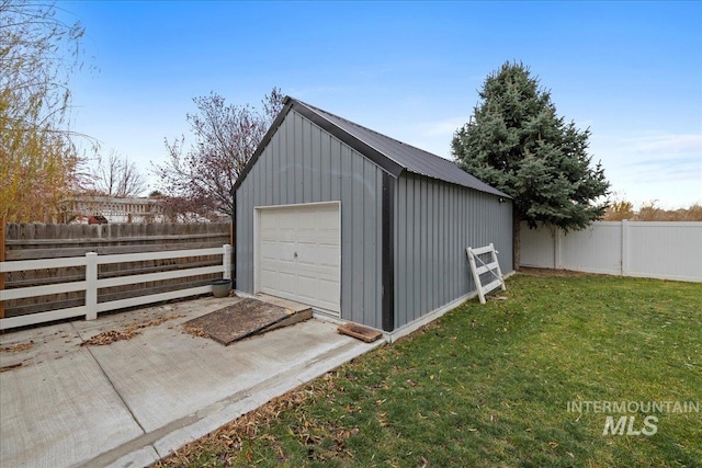 garage with a yard