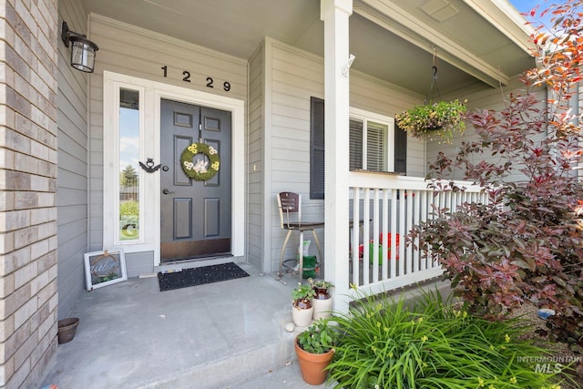 1229 N Hiltonhead Way, Eagle, ID 83616 - view of exterior entry featuring covered porch