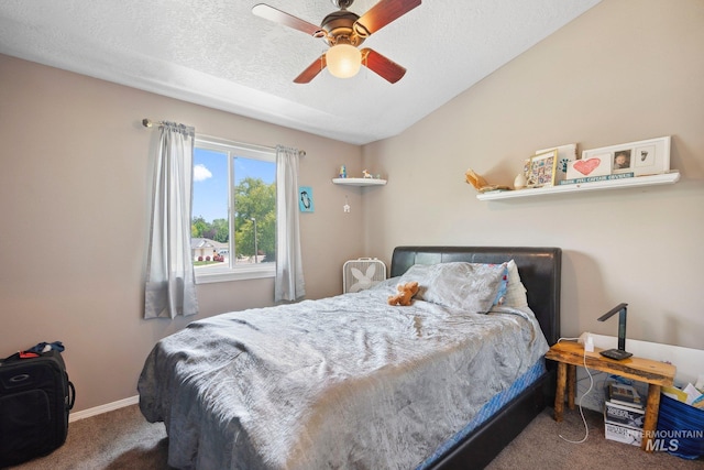 1229 N Hiltonhead Way, Eagle, ID 83616 - bedroom with carpet, a textured ceiling, baseboards, a ceiling fan, and lofted ceiling