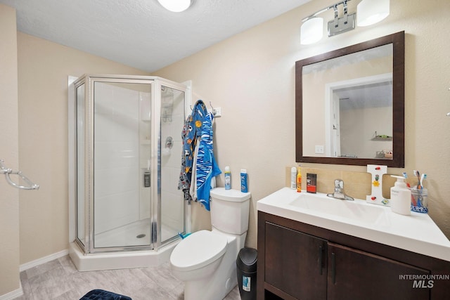 1229 N Hiltonhead Way, Eagle, ID 83616 - full bath featuring vanity, toilet, a shower stall, and baseboards