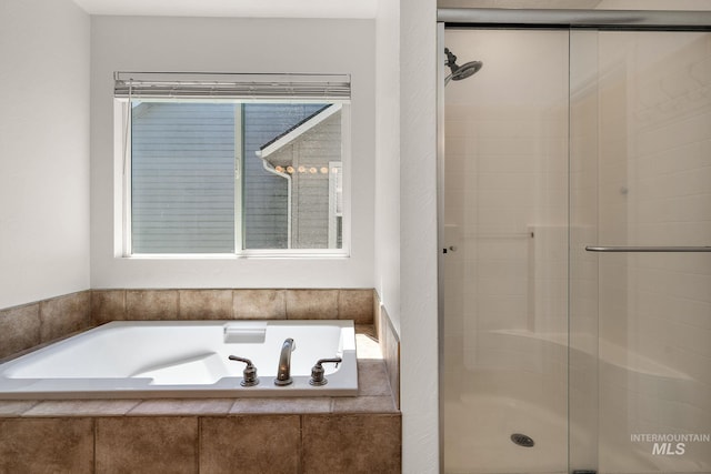 4902 N Schubert Ave, Meridian, ID 83646 - full bathroom featuring a stall shower and a garden tub