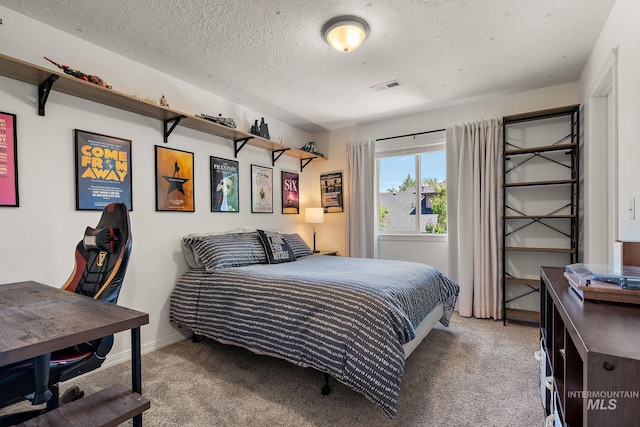4902 N Schubert Ave, Meridian, ID 83646 - bedroom featuring light carpet, a textured ceiling, and baseboards
