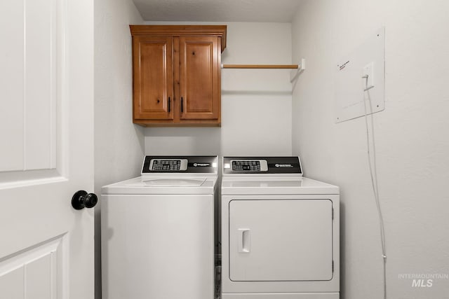 4902 N Schubert Ave, Meridian, ID 83646 - laundry room featuring independent washer and dryer and cabinet space