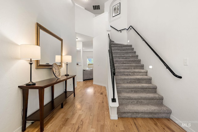 4902 N Schubert Ave, Meridian, ID 83646 - stairs featuring wood finished floors and baseboards