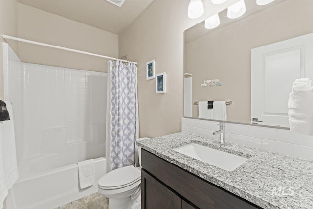 full bathroom with tasteful backsplash, toilet, vanity, and shower / bath combination with curtain