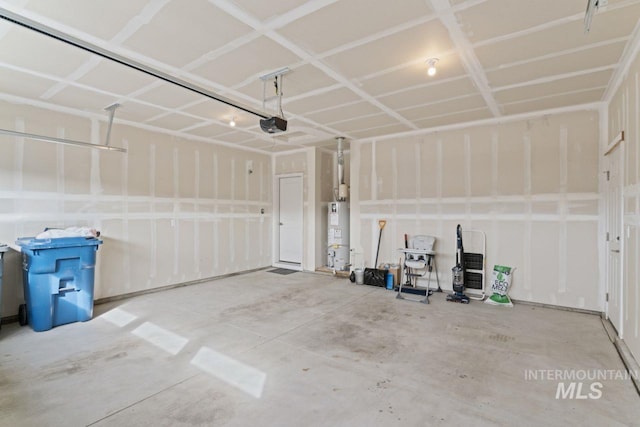 garage with gas water heater and a garage door opener