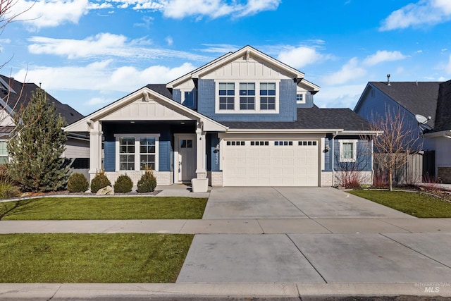 view of front of house with a garage and a front yard