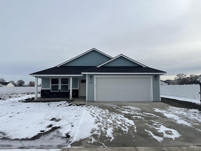 view of front of home with a garage