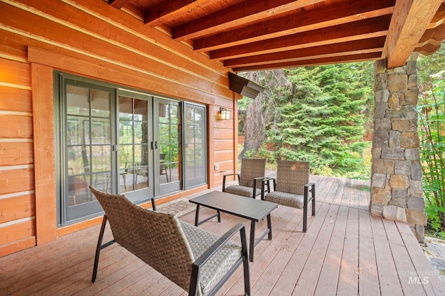 wooden deck with french doors