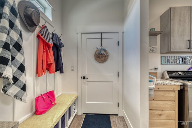 mudroom featuring light wood-style flooring