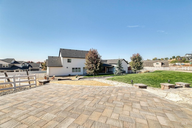 view of patio / terrace featuring a residential view and a fenced backyard