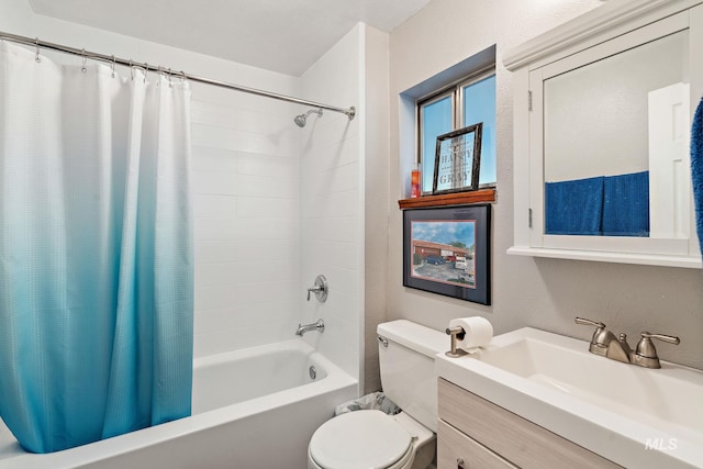 full bathroom with shower / bath combination with curtain, toilet, and vanity