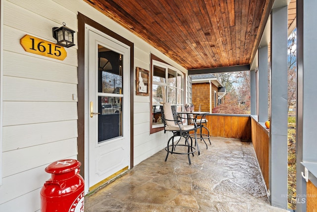 sunroom / solarium with wooden ceiling