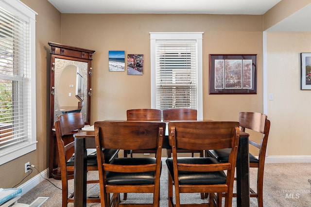 view of carpeted dining room