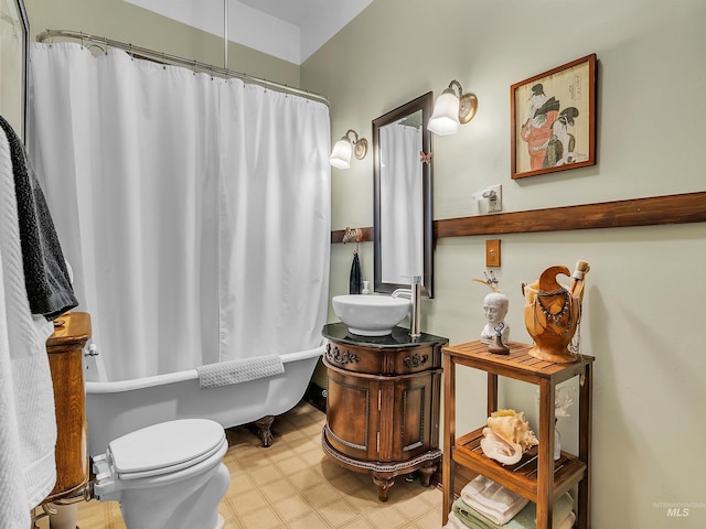1408 N 7th St, Boise, ID 83702 - bathroom featuring vanity, tile patterned floors, and toilet