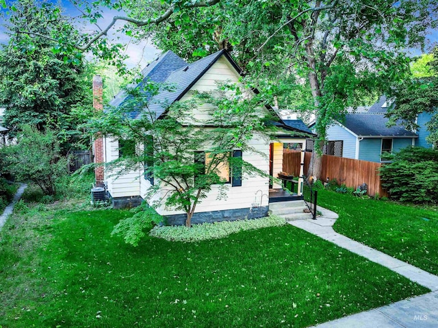 1408 N 7th St, Boise, ID 83702 - view of front of property featuring central AC unit and a chimney