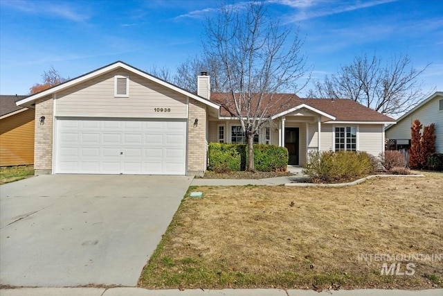 ranch-style home with a garage, brick siding, concrete driveway, a chimney, and a front yard