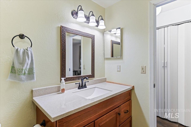 2429 Cherry St, Caldwell, ID 83605 - bathroom with vanity and a textured wall