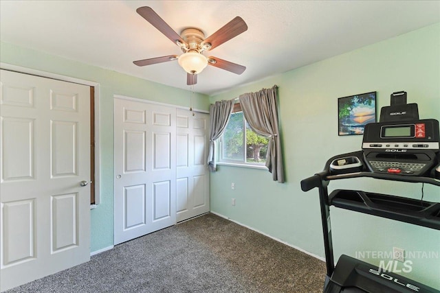 2429 Cherry St, Caldwell, ID 83605 - workout area featuring dark carpet, a ceiling fan, and baseboards
