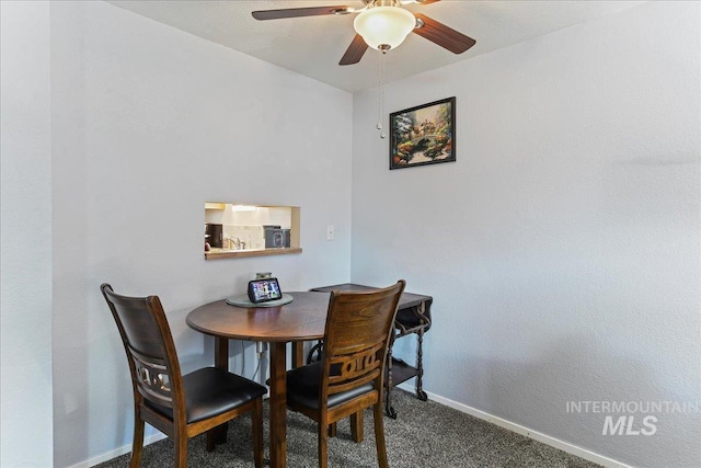 2429 Cherry St, Caldwell, ID 83605 - carpeted dining space featuring baseboards and a ceiling fan