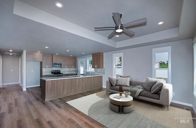 garage with electric panel and water heater