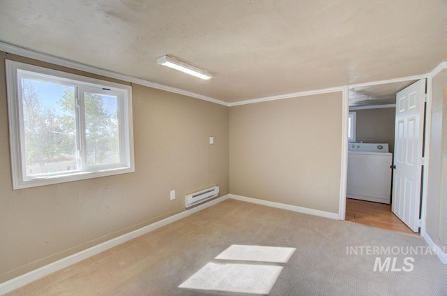 unfurnished bedroom featuring light carpet, washer / clothes dryer, a baseboard radiator, and ornamental molding