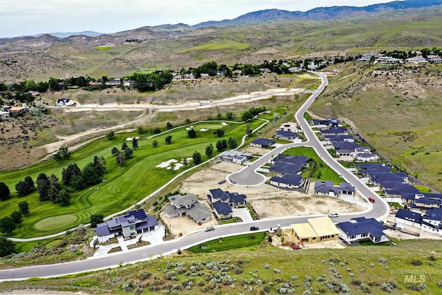 bird's eye view with a mountain view