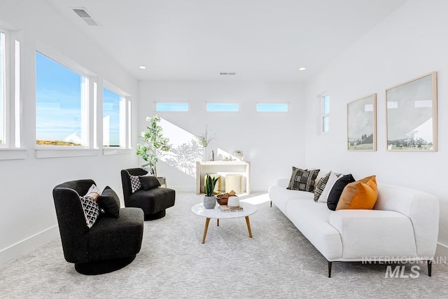 14241 N Woodpecker Ave, Boise, ID 83714 - carpeted living area with healthy amount of natural light, recessed lighting, and baseboards