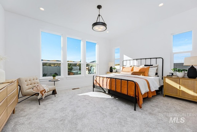 14241 N Woodpecker Ave, Boise, ID 83714 - bedroom featuring light carpet and recessed lighting
