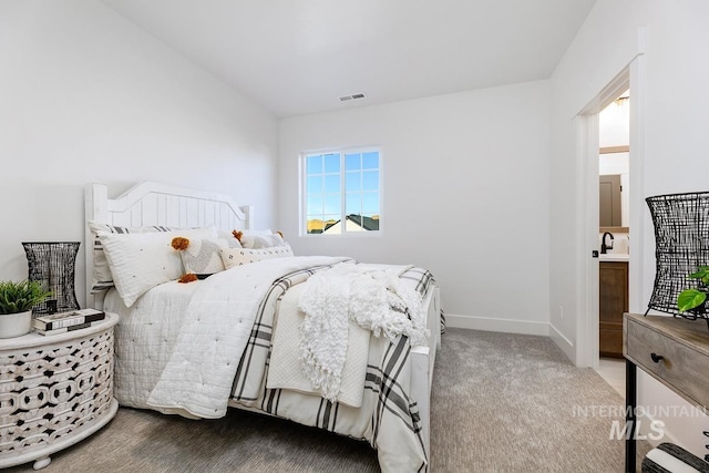 14241 N Woodpecker Ave, Boise, ID 83714 - bedroom featuring baseboards, a sink, and carpet flooring