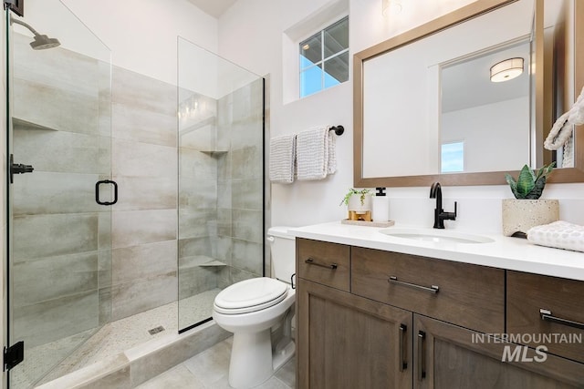 14241 N Woodpecker Ave, Boise, ID 83714 - bathroom featuring a shower stall, vanity, and toilet