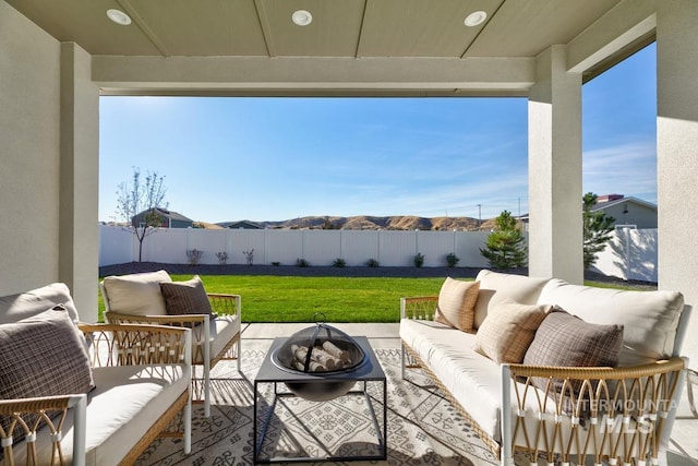 14241 N Woodpecker Ave, Boise, ID 83714 - view of patio with an outdoor living space with a fire pit