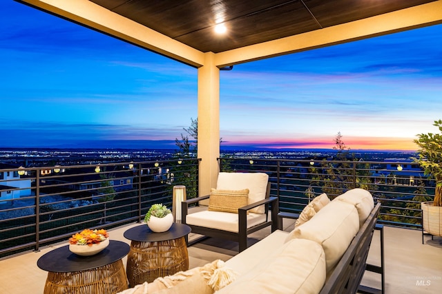 3501 E Planet Dr, Boise, ID 83712 - patio terrace at dusk featuring a balcony and an outdoor living space