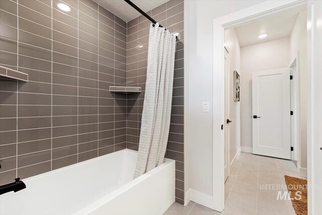 3501 E Planet Dr, Boise, ID 83712 - full bath with shower / tub combo, baseboards, and tile patterned floors