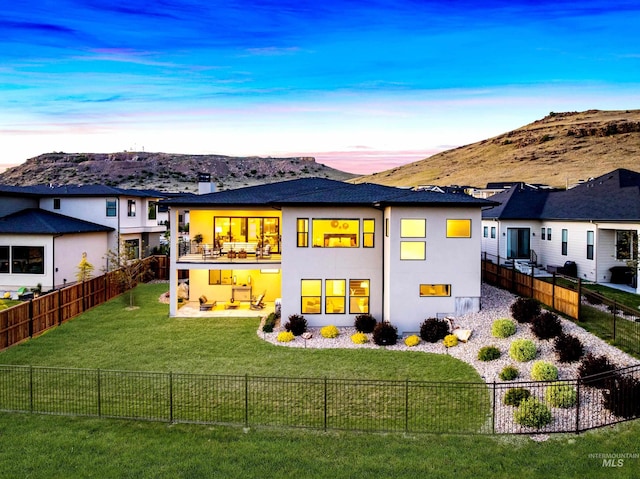 3501 E Planet Dr, Boise, ID 83712 - rear view of property with stucco siding, a mountain view, a patio, and a chimney