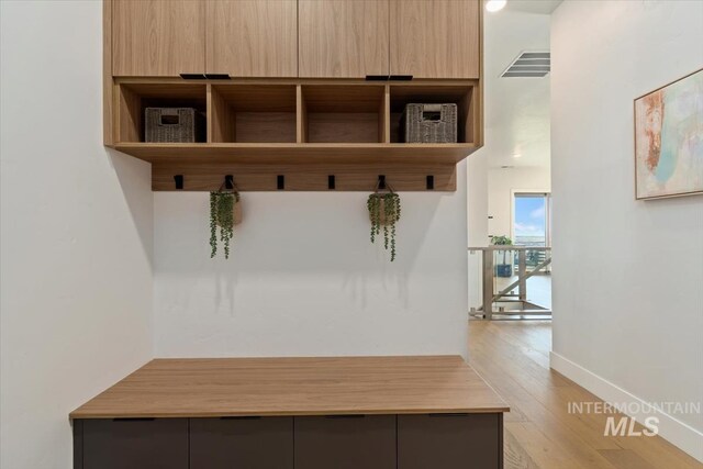 3501 E Planet Dr, Boise, ID 83712 - mudroom featuring wood finished floors and baseboards