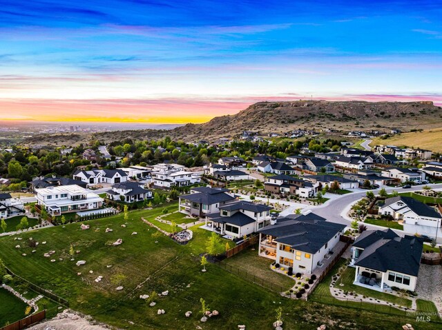 3501 E Planet Dr, Boise, ID 83712 - aerial view at dusk of a residential view and a mountain view