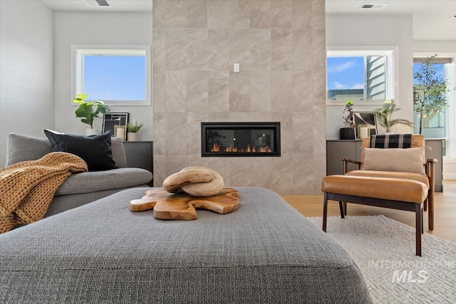 3501 E Planet Dr, Boise, ID 83712 - bedroom with wood finished floors and a fireplace