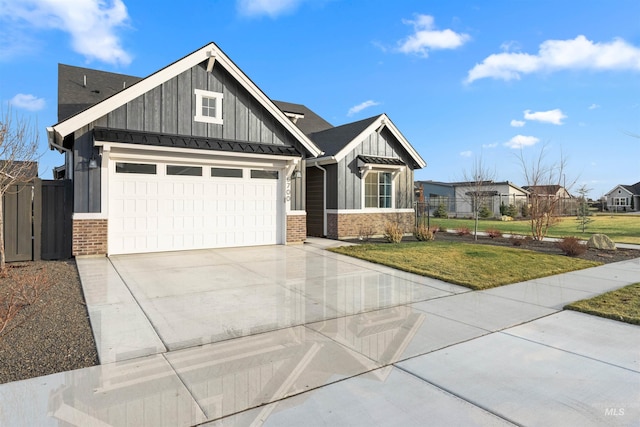 craftsman-style home with a garage and a front yard