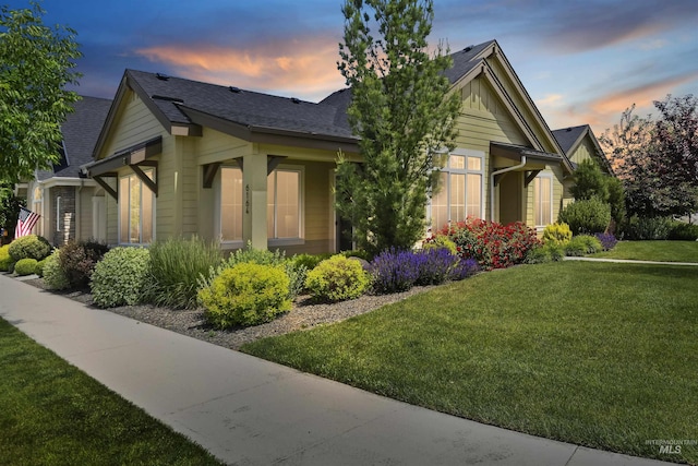 6164 N Winward Ln, Meridian, ID 83646 - view of property exterior featuring a yard, roof with shingles, and board and batten siding