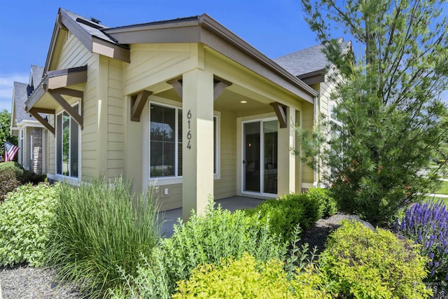 6164 N Winward Ln, Meridian, ID 83646 - property entrance with roof with shingles
