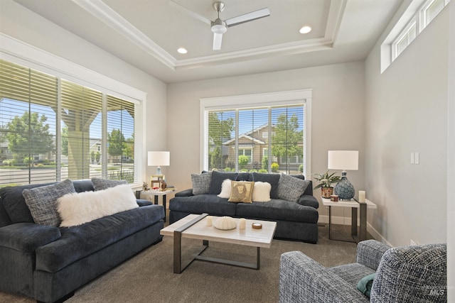 6164 N Winward Ln, Meridian, ID 83646 - carpeted living room featuring plenty of natural light, a raised ceiling, a ceiling fan, and recessed lighting