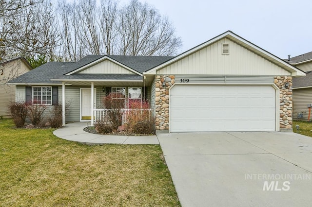 ranch-style house featuring driveway, an attached garage, a shingled roof, a front lawn, and stone siding