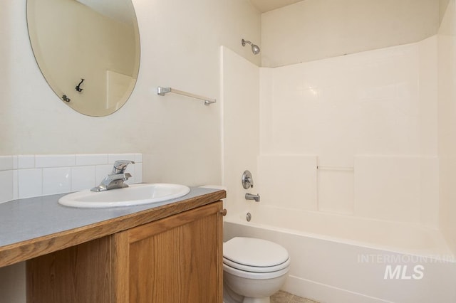 full bathroom with vanity, toilet, and bathtub / shower combination