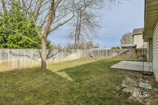 view of yard featuring a fenced backyard and a patio