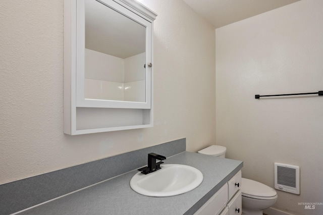 228 N Latah St, Boise, ID 83706 - bathroom featuring vanity and heating unit